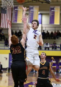 Senior Ryan Carmello makes shoots basket