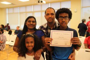 P-Tech student and his family at induction ceremony.