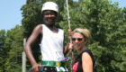 Female student and teacher getting ready for ropes course at HVCC