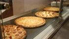 Four pizzas. Two pepperoni, two cheese.
