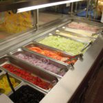 Photo of the Deli at Troy High School. Items include lunch meat, cheese, and various vegetables.