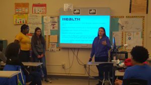 P-TECH students delivering presentations
