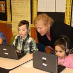 Students working on computer coding