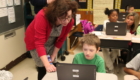 Students working on computer coding