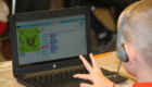 Students working on computer coding