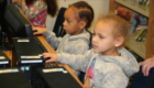 Students working on computer coding
