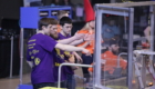 Troy students competing in robotics competition