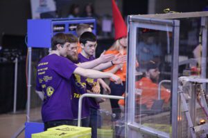 Troy students competing in robotics competition