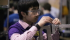 Troy students competing in robotics competition