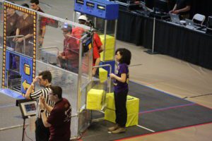 Troy students competing in robotics competition