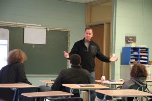 Detective Millington speaks to School 12 students about interacting with police officers.