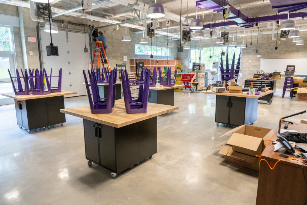 A fabrication lab in the with various tools, tables and materials
