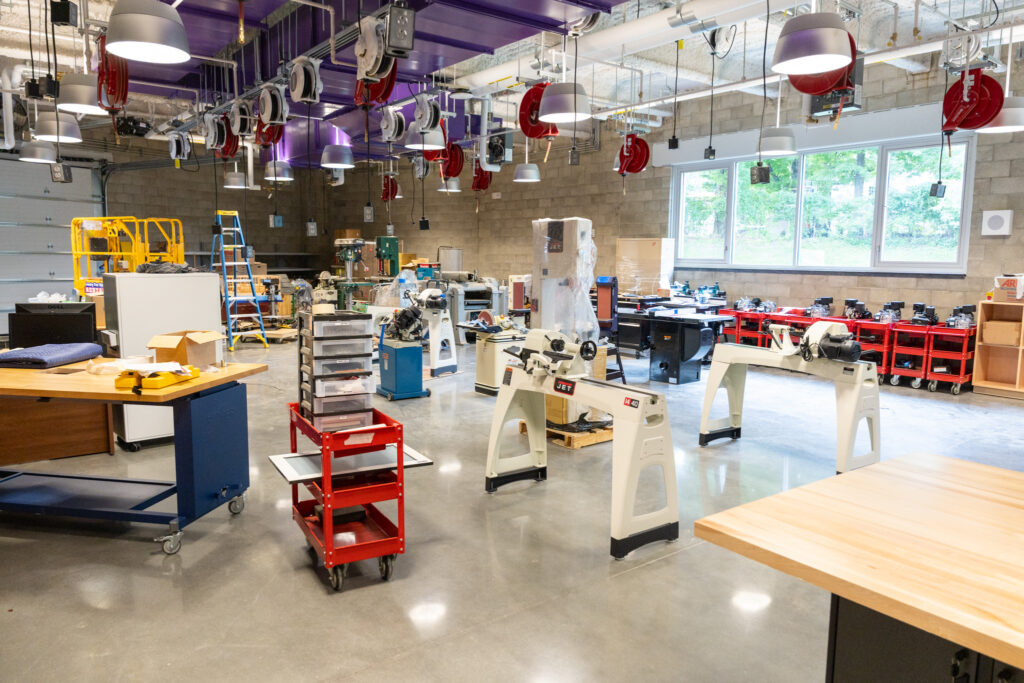 A fabrication lab in the with various tools, tables and materials